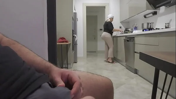 Risky jerk off while watching big ass stepmom in the kitchen.