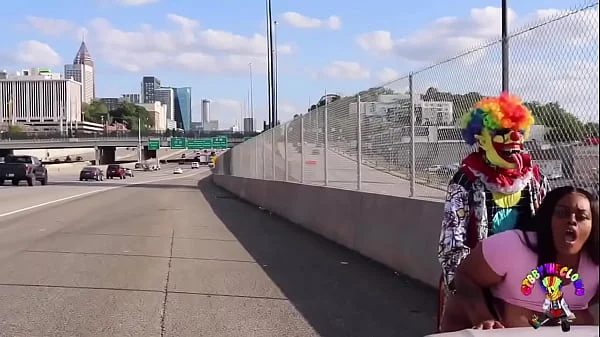 Juicy Tee Gets Fucked by Gibby The Clown on A Busy Highway During Rush Hour