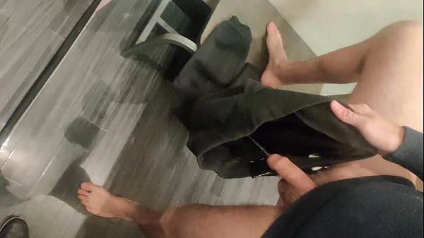 Pissing in a Fitting Room, Using a Pair of Pants