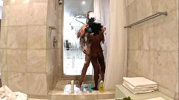 Sexy Black Milf takes a hot steamy shower with white sugar daddy at his penthouse