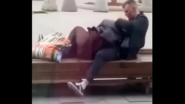 Stupid blonde gives blowjob in public