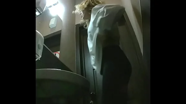 MOV 96. Girls piss in the toilet of the cafe