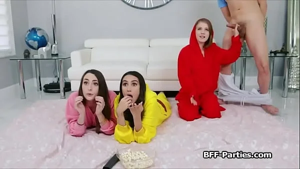 Three girlfriends spicing up pajama party with a cock